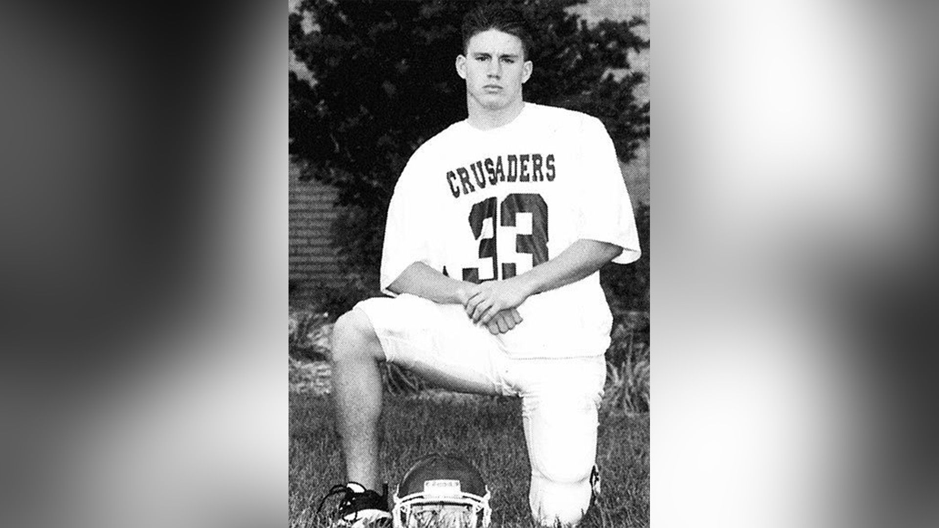 Young actor Channing Tatum poses in American football gear