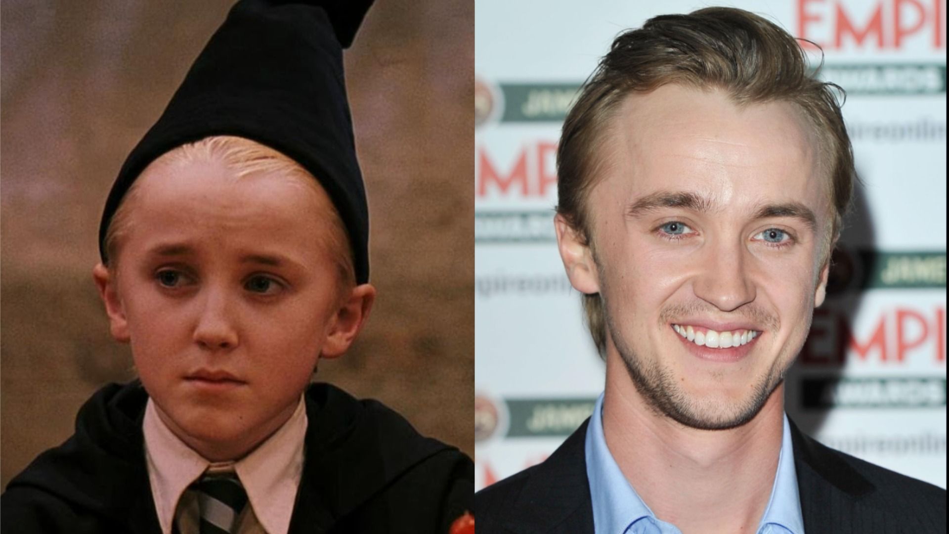 Actor Tom Felton in a black jacket looks at the camera and smiles against the backdrop of an advertisement poster